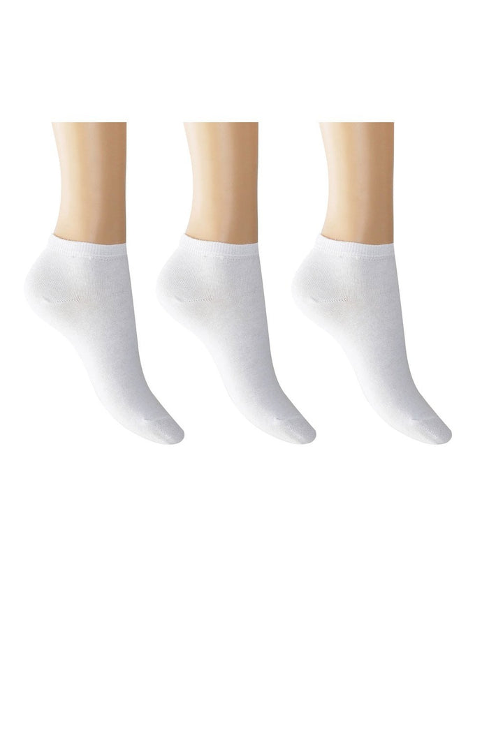 Three pairs of white socks on a white background
