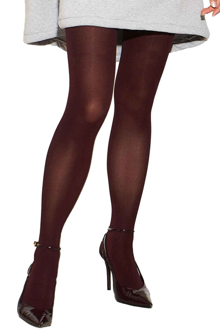 Allana burgundy tights worn by a model on a white background