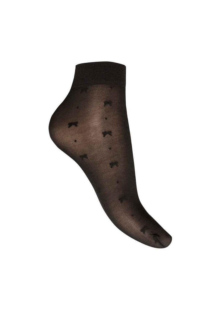 Black sheer sock with small bow and spot patterns on a white background