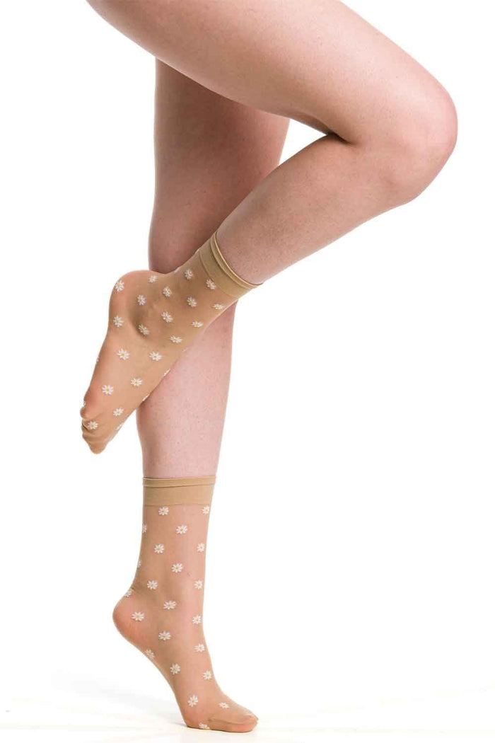 Trasparenze millibar daisy socks worn by a person on a white background