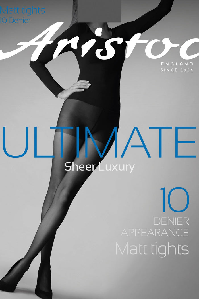 Aristoc tights advertisement with a model wearing black tights on a gray background.