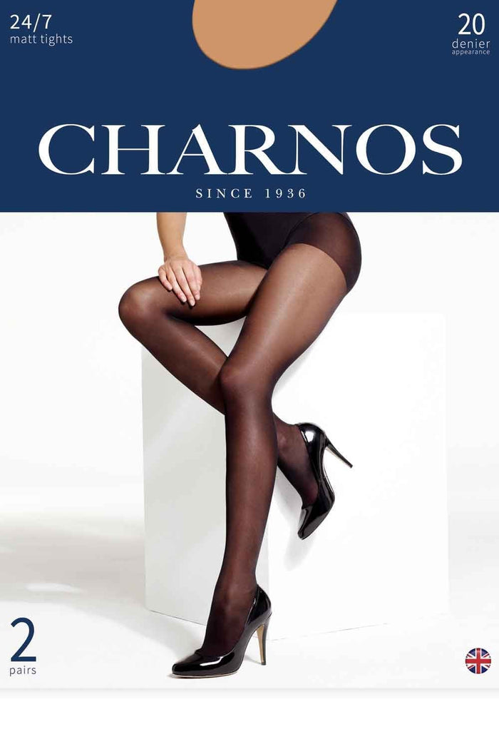 Charnos tights packaging with a model wearing black tights and shoes.