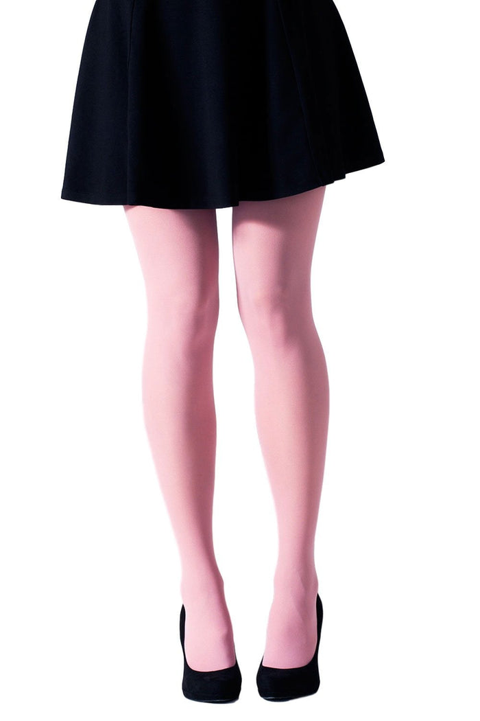 Person wearing pink gipsy tights and black shoes on a white background