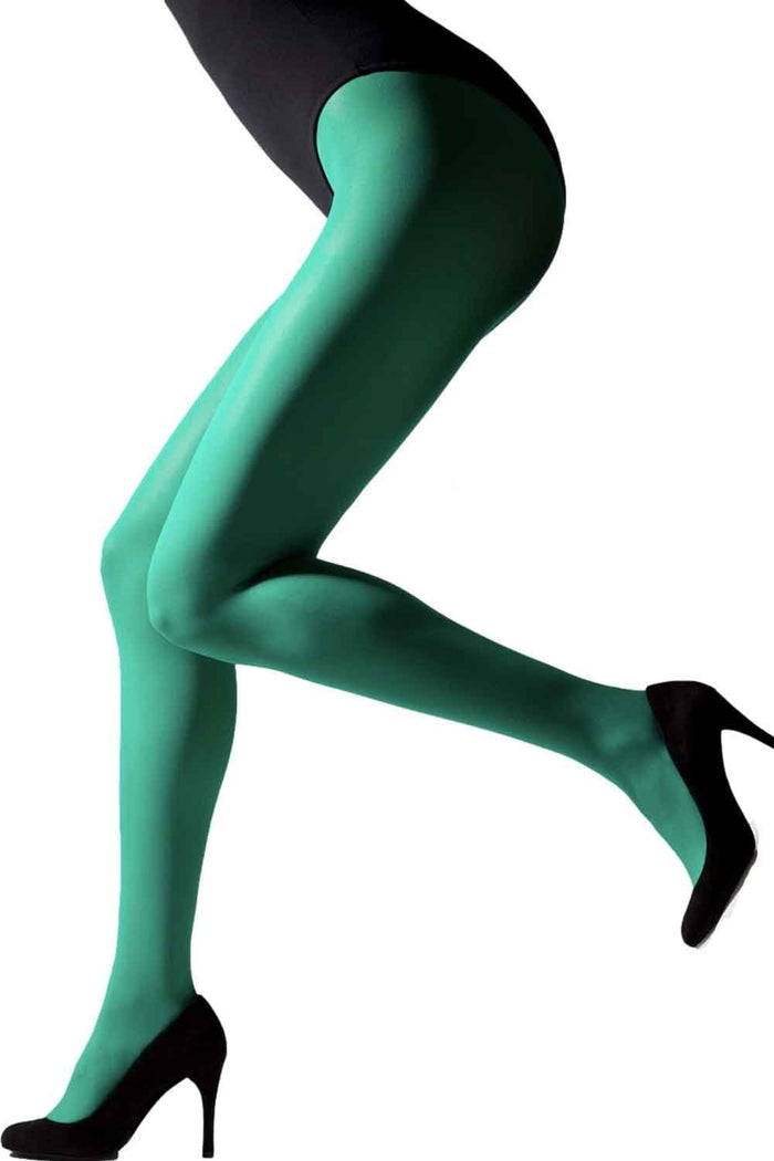 Green gipsy tights worn by a person on a white background