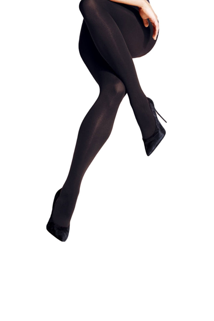 Black tights worn by a person on a white background
