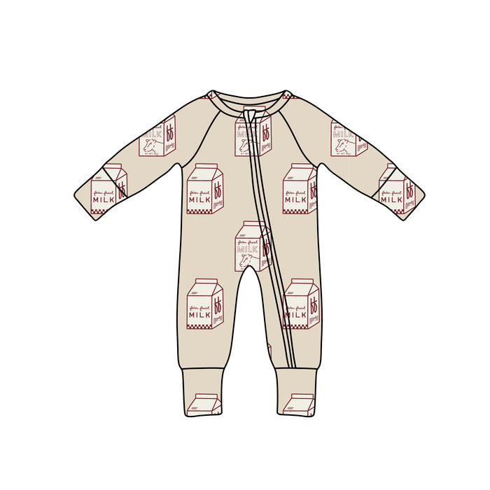 The forever french baby Bamboo Zip Pajamas | Milk are beige, long-sleeve onesies with red milk carton prints and a diagonal neck-to-leg zipper. Made from breathable fabric for ultimate comfort.
