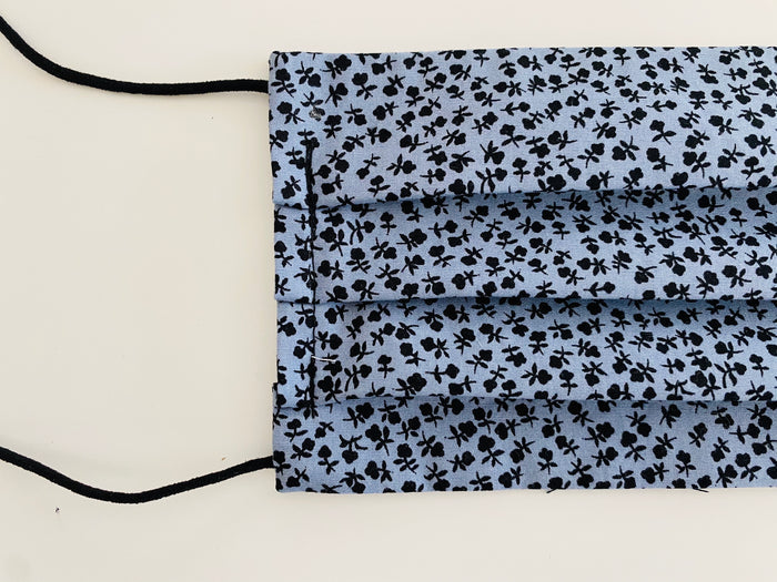Black and blue re- usable adjustable face cover