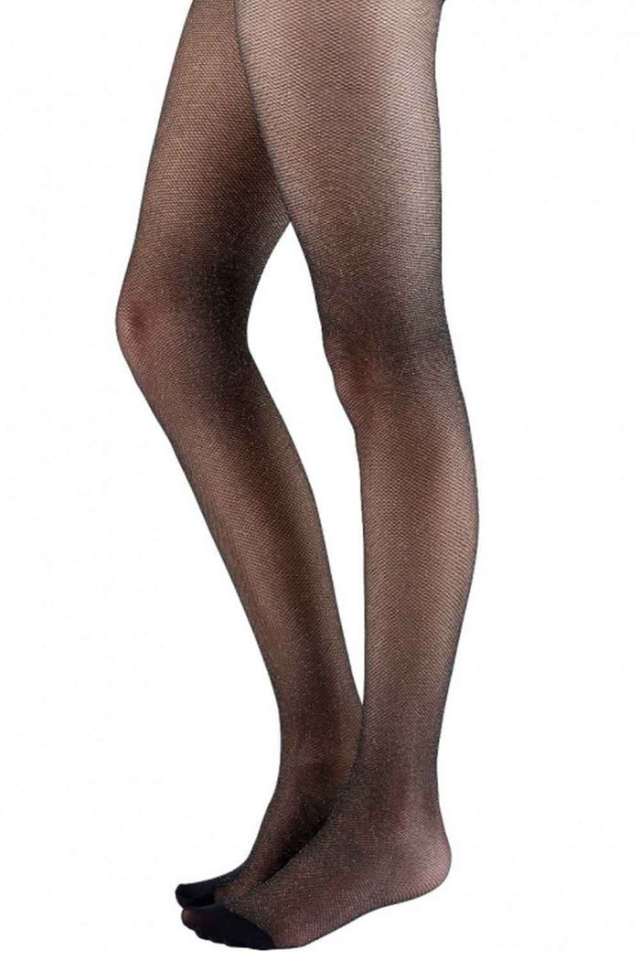 Black/silver fishnet  tights worn by a person on a white background