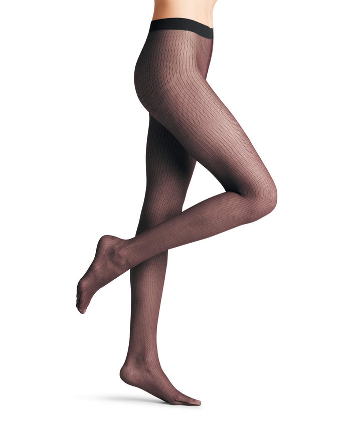 Patterned chain tights worn by a model on a white background