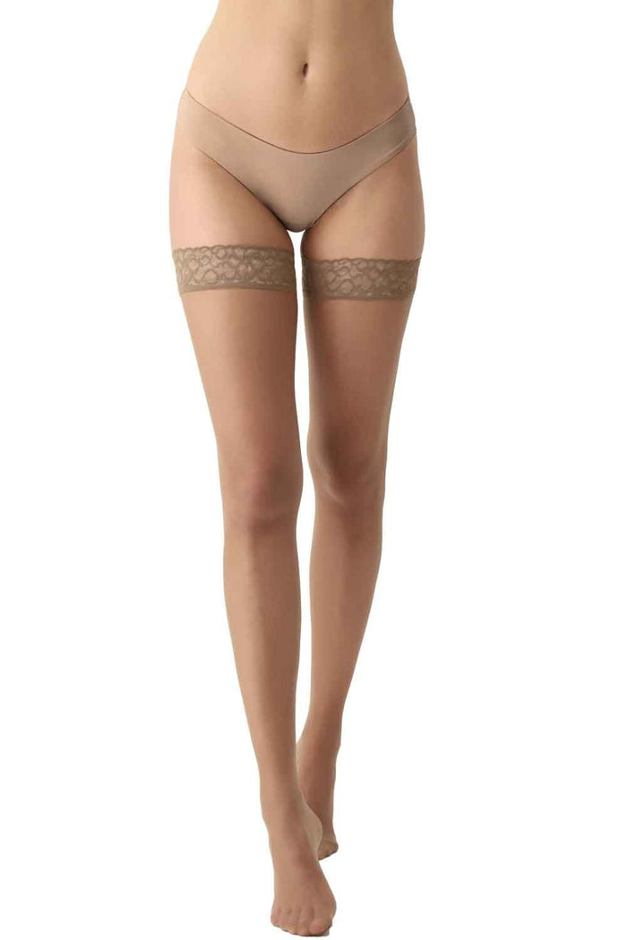 Beige lace-ttop hold ups  on a white background