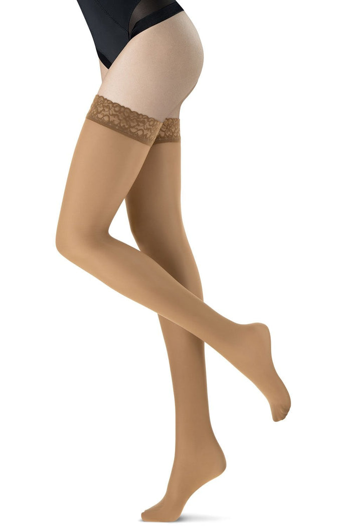 hold ups with lace top worn by a person on a white background