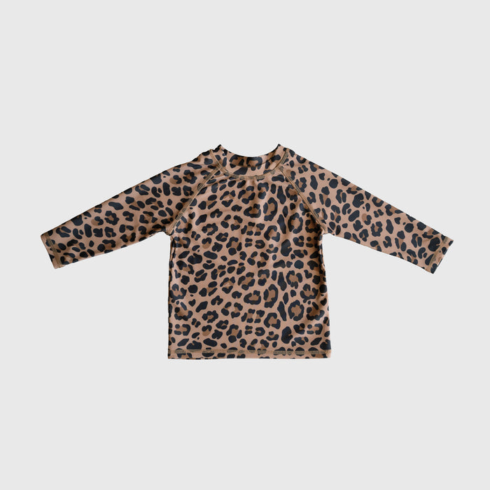 The *PRE-ORDER* Child Rash Guard | Leopard from forever french baby features a brown base with black leopard print—stylish kids swimwear laid flat on white, perfect for your little one.