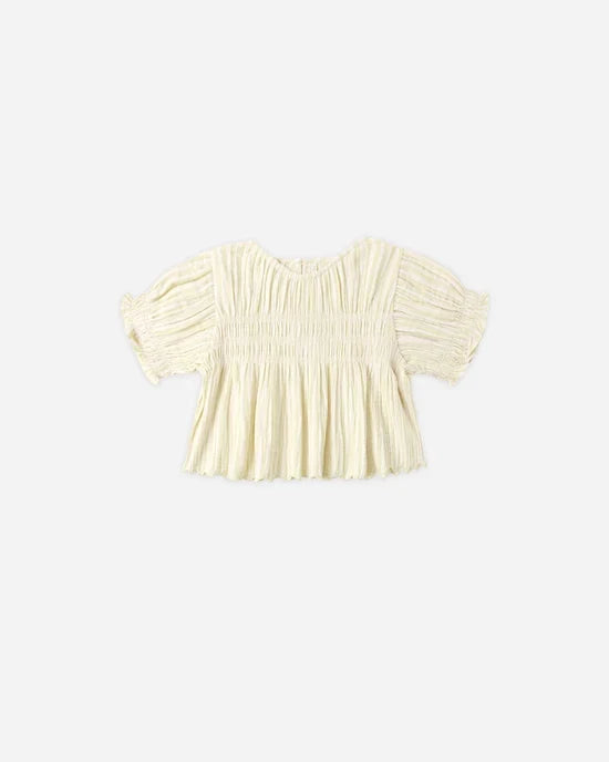 Cream-colored, short-sleeve Colette Top in Citron Stripe by Rylee + Cru, featuring a loose fit with textured, pleated fabric and delicate embroidered scallop edge detailing, displayed on a plain light background.