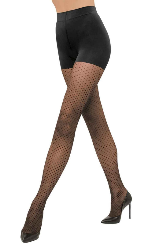 Black dot control tights worn with black high heels on a white background