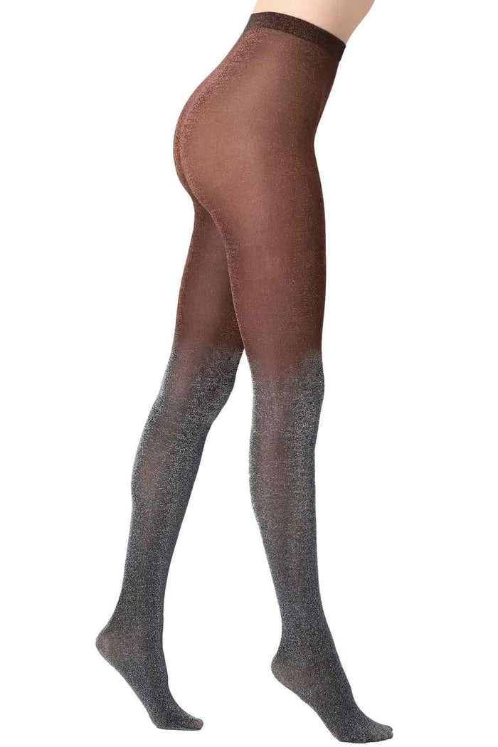 Sparkly siver /bronze tights worn by a person on a white background