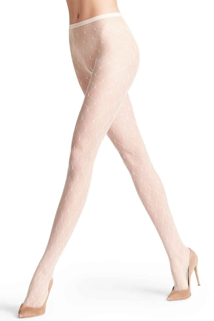 Diamond net tights worn by a model on a white background