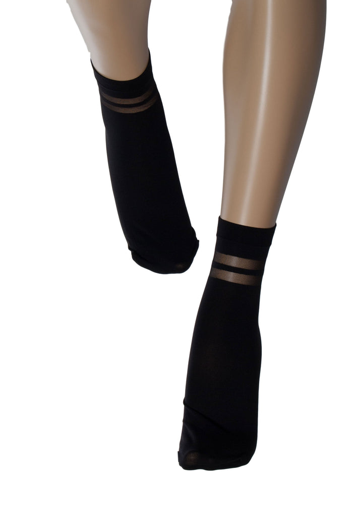 Black ankle socks with mesh stripes worn by a model on a white background