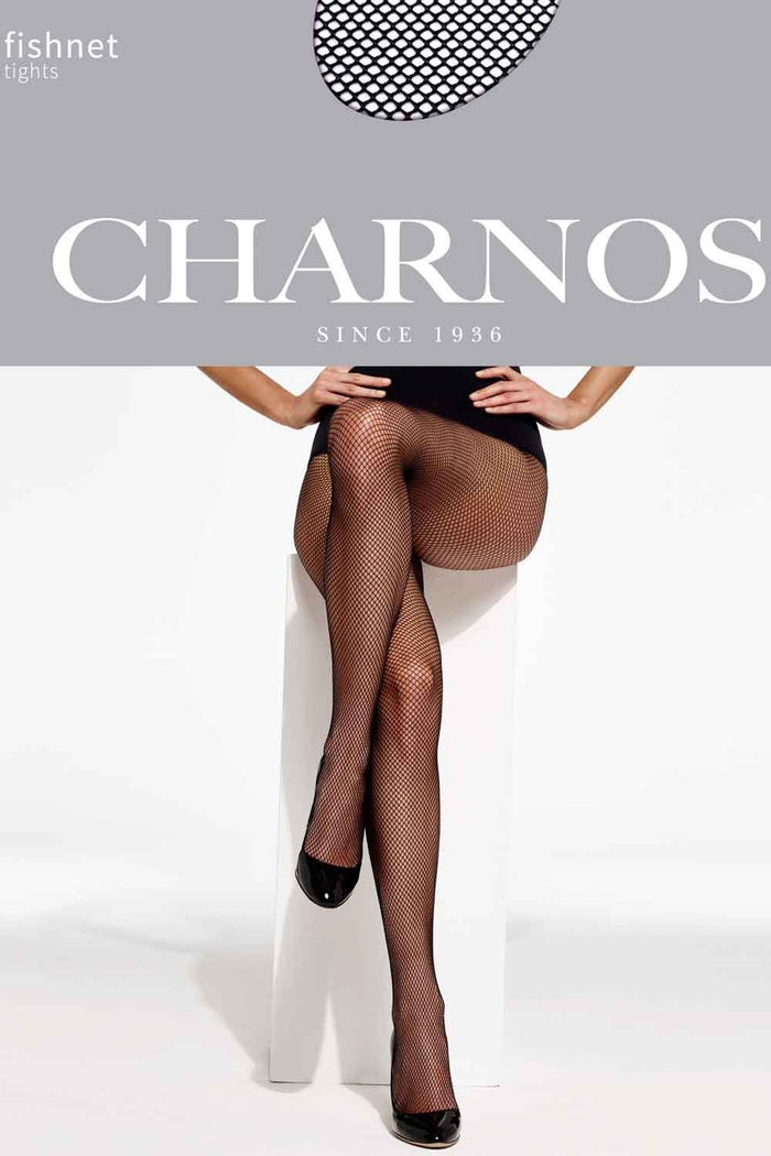 Model wearing fishnet tights by Charnos on a white background