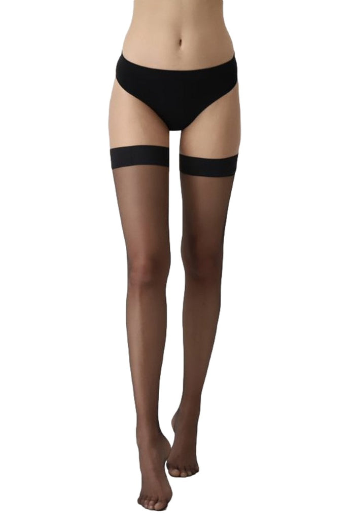 Black sheer hold ups  worn by a person on a white background