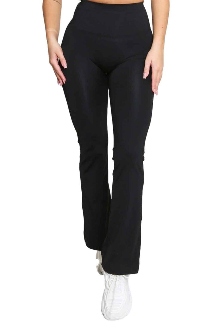 Allana black flared leggings worn by a model on a white background