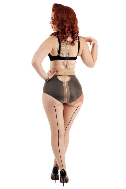 Model wearing a black bra and jive seamed tights in nude/black on a white background