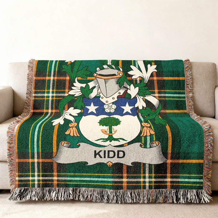 Kidd family crest on an Irish National Tartan woven cotton throw.