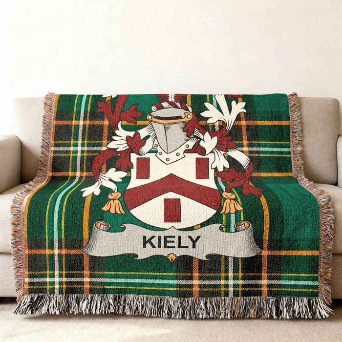 Kiely family crest on an Irish National Tartan woven cotton throw.