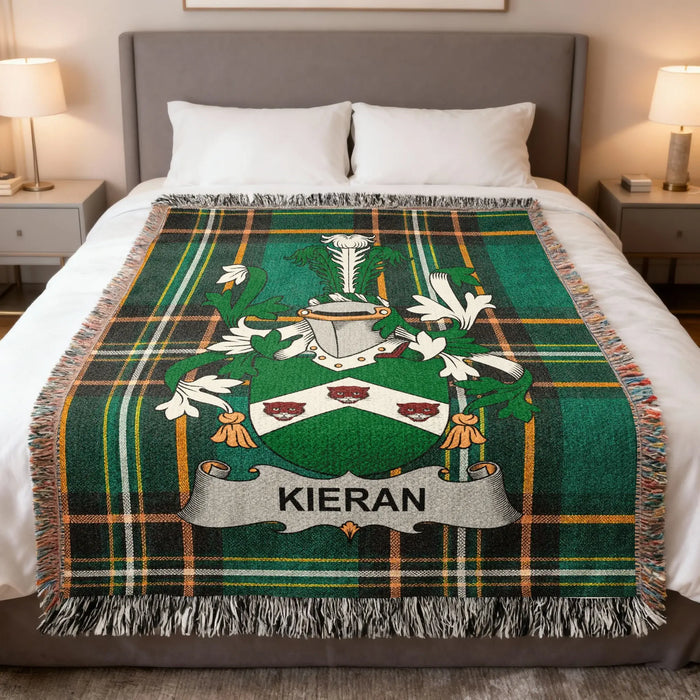 Kieran Irish family crest woven blanket displayed on a bed.