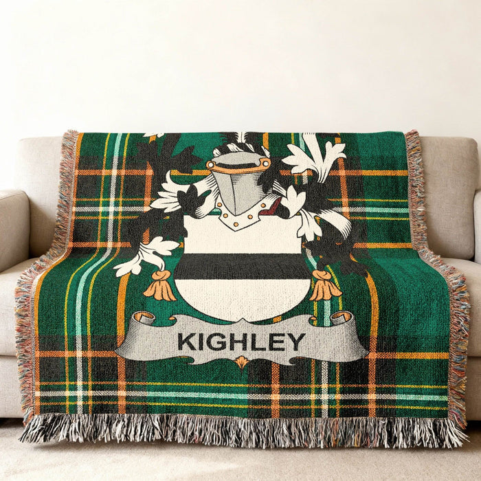 Green tartan throw blanket featuring the Kighley family crest.