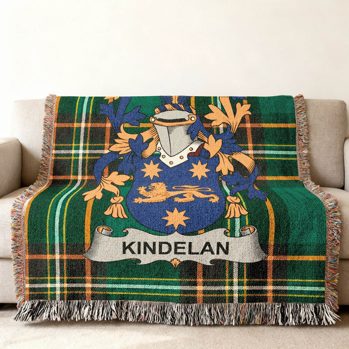 Kindelan family crest on an Irish National Tartan woven cotton throw.
