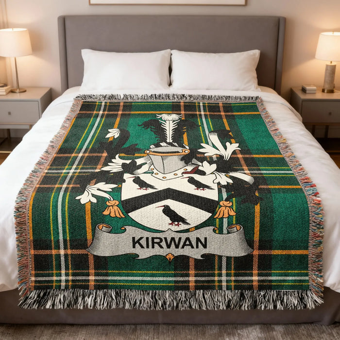 Kirwan Irish family crest woven blanket displayed on a bed.