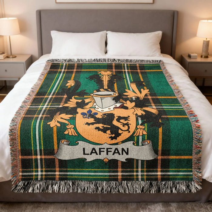 Laffan Irish family crest woven blanket displayed on a bed.