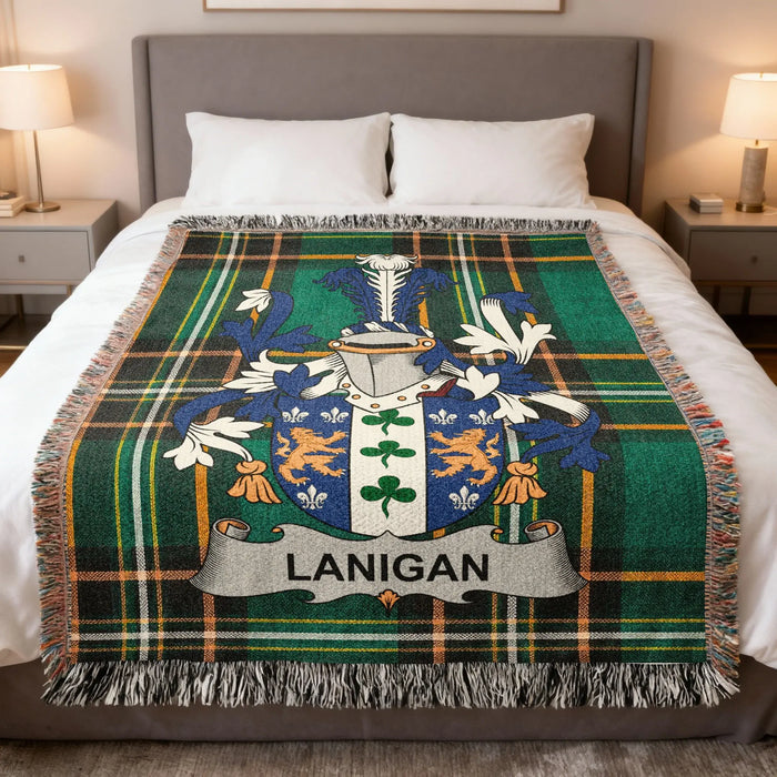 Lanigan Irish family crest woven blanket displayed on a bed.