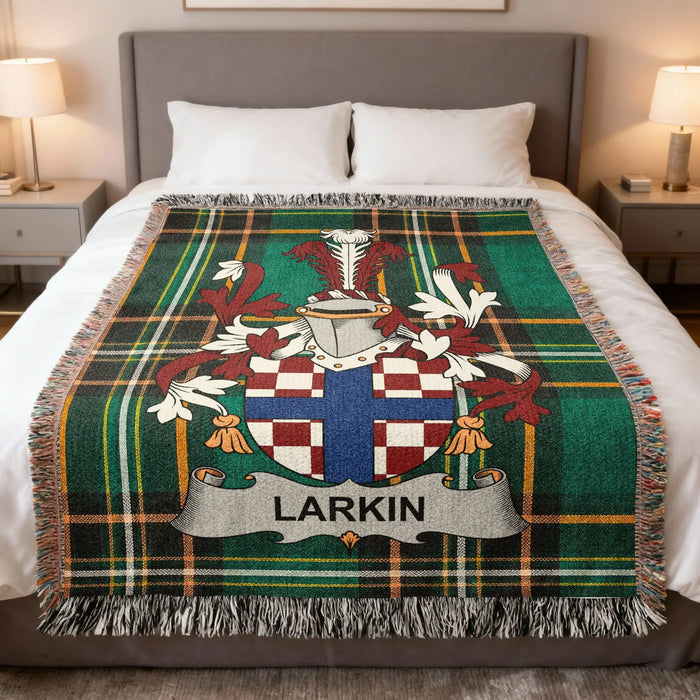 Larkin Irish family crest woven blanket displayed on a bed.