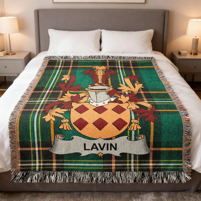 Lavin Irish family crest woven blanket displayed on a bed.