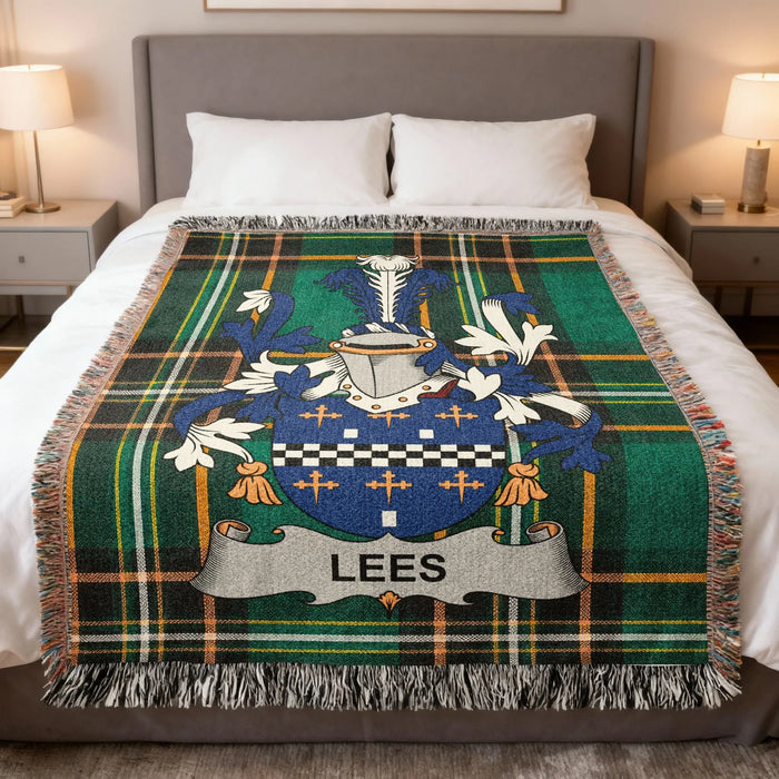 Lees family crest woven blanket set out on a bed.