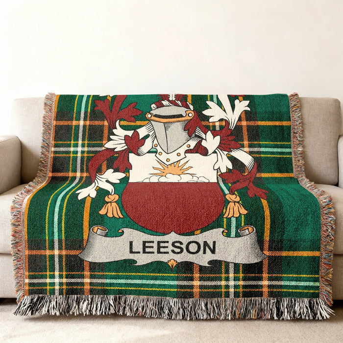 Leeson family crest on an Irish National Tartan woven cotton throw.
