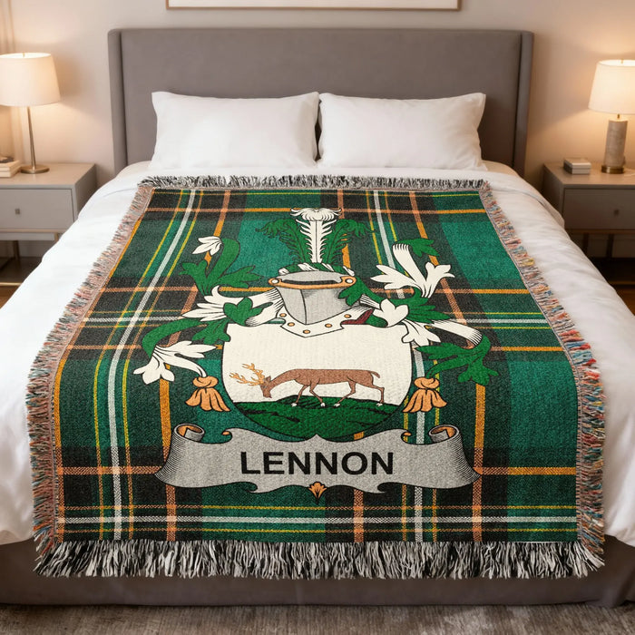Lennon Irish family crest woven blanket displayed on a bed.