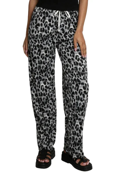 Leopard Print trousers by Allana, model standing with a white background