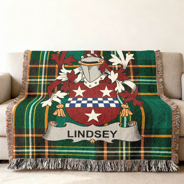 Detail of the Lindsey crest against Irish National Tartan.