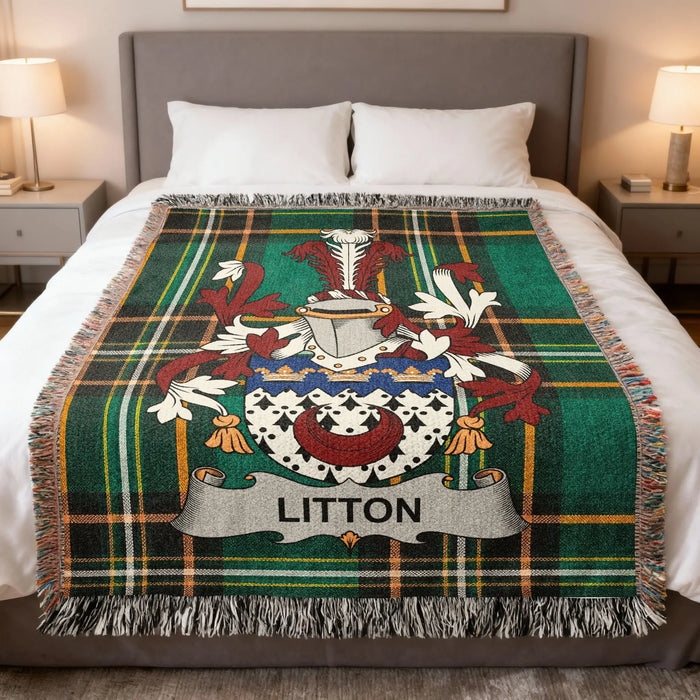 Litton family crest Irish National Tartan woven blanket displayed on a bed.