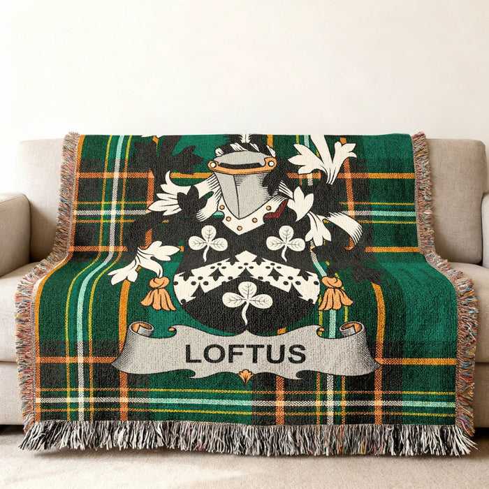 Close view of the Loftus family crest woven into Irish National Tartan cotton fabric.