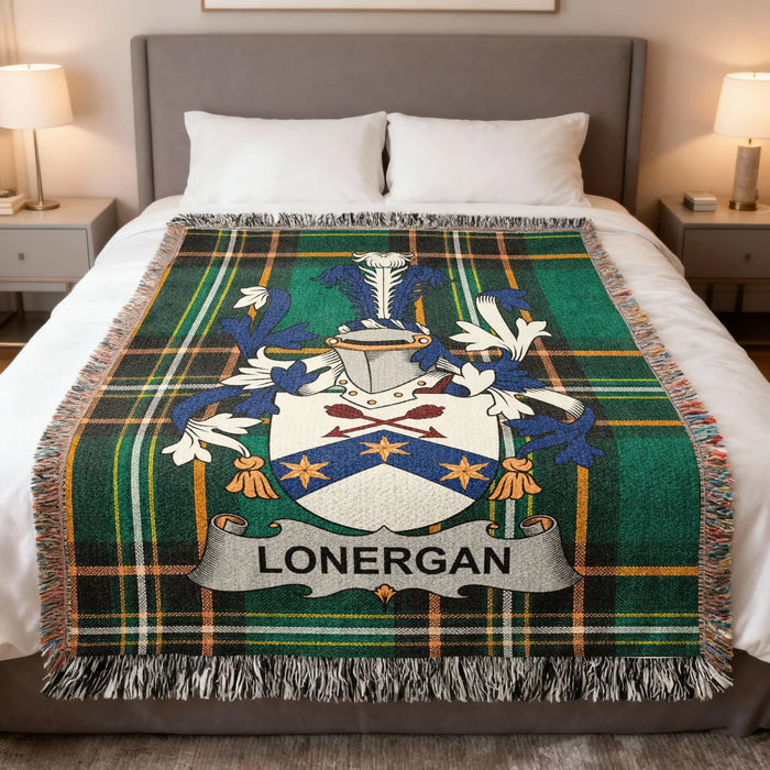 Green tartan blanket featuring Lonergan family crest with blue shield and gold stars.