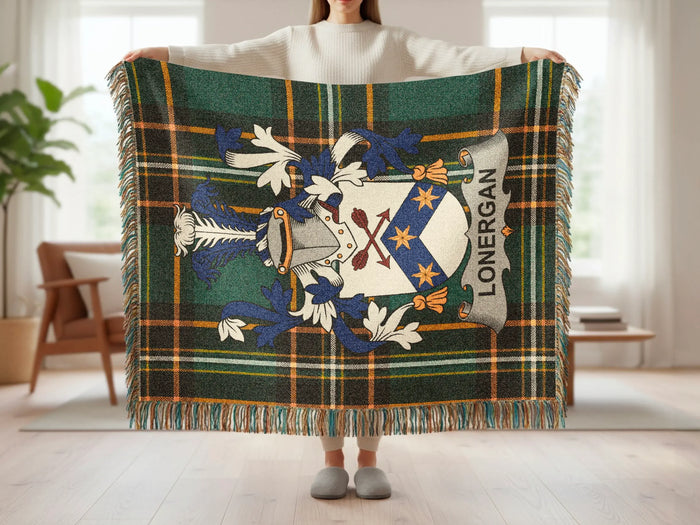 Tartan blanket with the Lonergan crest and fringed edges.