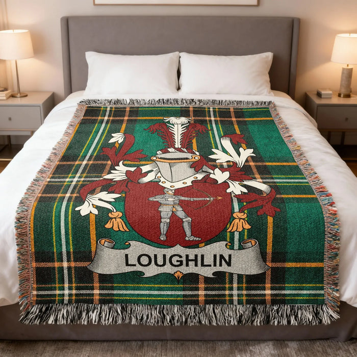Loughlin family crest displayed on a green plaid woven throw blanket.