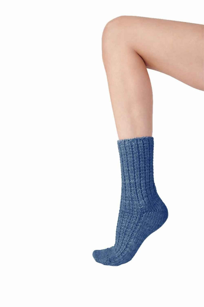 Blue knitted sock on a white background