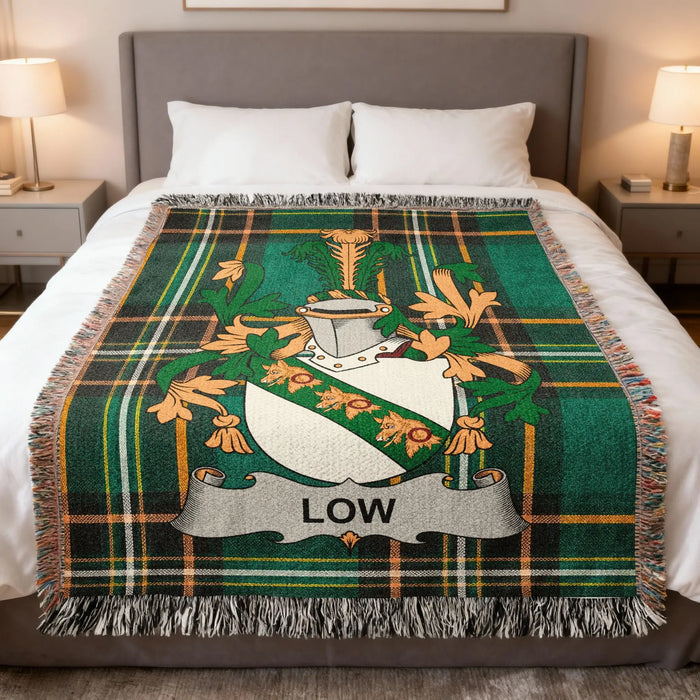 Low family crest Irish National Tartan woven blanket displayed on a bed.