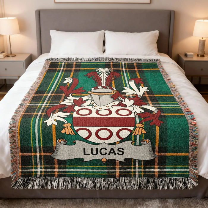 Lucas family crest Irish National Tartan woven blanket displayed on a bed.