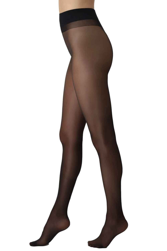 Black 20 denier  tights worn by a person on a white background