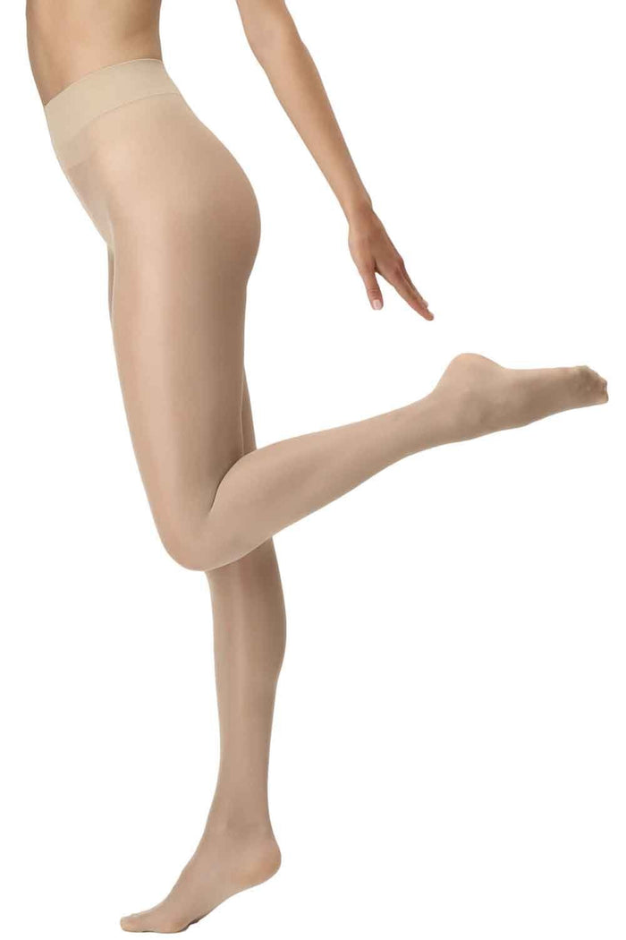 Beige tights worn by a person on a white background